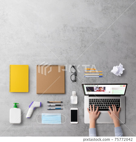 Flat lay top view of school supplies, distance learning and coronavirus concept. Flat lay top view of school supplies, distance learning and coronavirus concept. 75772042