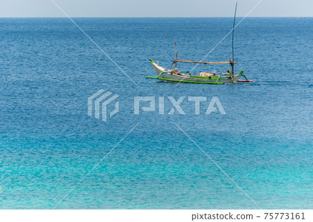 Asian blue sea and fishing boats 75773161