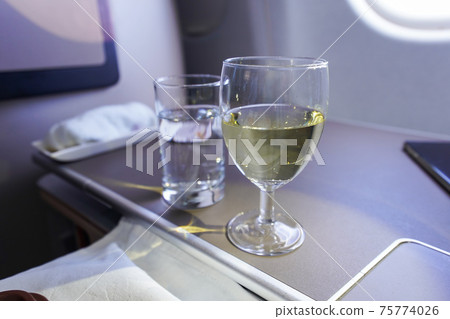 Business class in-flight service Business class in-flight service 75774026