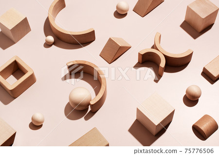 Abstract wooden background, natural geometric shapes on beige background Abstract wooden background, natural geometric shapes on beige background 75776506