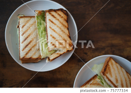 Sandwich placed on the table Sandwich placed on the table 75777334
