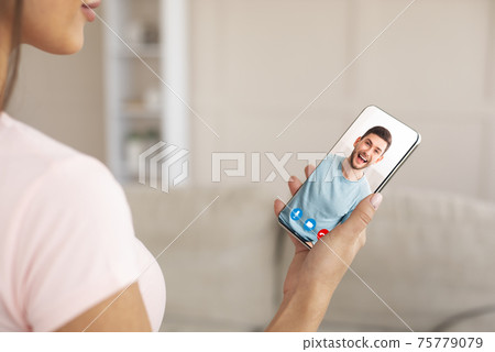 Virtual Call. Unrecognizable Lady Video Chatting With Boyfriend Via Teleconference On Smartphone Virtual Call. Unrecognizable Lady Video Chatting With Boyfriend Via Teleconference On Smartphone 75779079