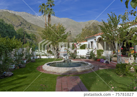 Garden By House And Against Mountains 75781027
