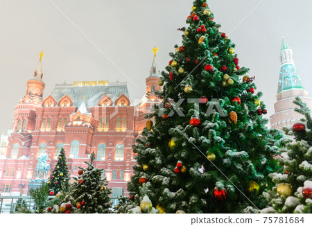Christmas trees at the Manezh Square in Moscow on the background of the Historical Museum and the Kremlin Christmas trees at the Manezh Square in Moscow on the background of the Historical Museum and the Kremlin 75781684