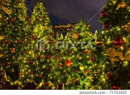 Toys on the Christmas trees at the Manege square in Moscow. Toys on the Christmas trees at the Manege square in Moscow. 75781685