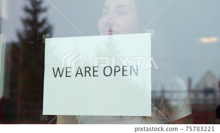 Woman stickers We are open re-opens after the end of the coronavirus quarantine in the cafe the coffee shop is ready for service Woman stickers We are open re-opens after the end of the coronavirus quarantine in the cafe the coffee shop is ready for service 75783221