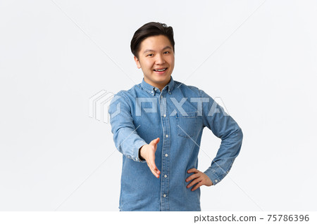 Friendly cheerful asian man searching for job, come to interview, extending hand for handshake, greeting someone, welcome to office, saying hello with happy smile, white background Friendly cheerful asian man searching for job, come to interview, extending hand for handshake, greeting someone, welcome to office, saying hello with happy smile, white background 75786396