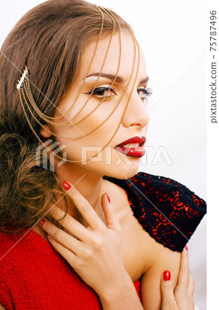 young pretty woman with fashion style makeup, chain like gussar role isolated on white background, red nails manicure 75787496