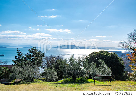 Beautiful scenery of the glittering Seto Inland Sea and olive groves, Ushimado-cho, Setouchi City, Okayama Prefecture Beautiful scenery of the glittering Seto Inland Sea and olive groves, Ushimado-cho, Setouchi City, Okayama Prefecture 75787635