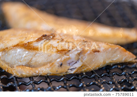 Dried fish with striped atka mackerel (black mirin) charcoal grilled Dried fish with striped atka mackerel (black mirin) charcoal grilled 75789011