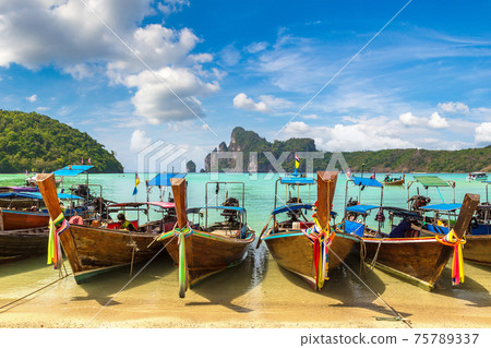 Traditional thai boat on Phi Phi Don Traditional thai boat on Phi Phi Don 75789337