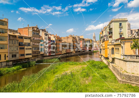 Colorful houses and Eiffel bridge in Girona Colorful houses and Eiffel bridge in Girona 75792786