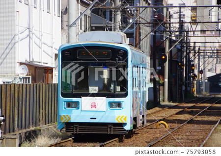 Hankai Tramway departing from Shin-Imamiya Station stop Hankai Tramway departing from Shin-Imamiya Station stop 75793058