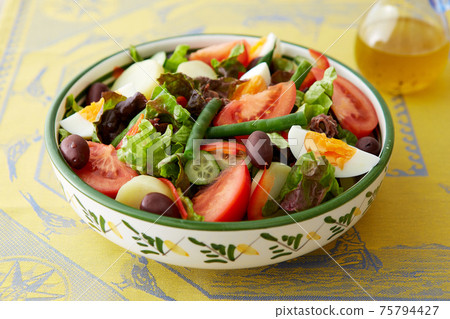 Nice salad with colorful ingredients Nice salad with colorful ingredients 75794427