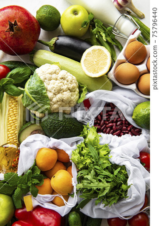 A variety of organic fruits and vegetables A variety of organic fruits and vegetables 75796440