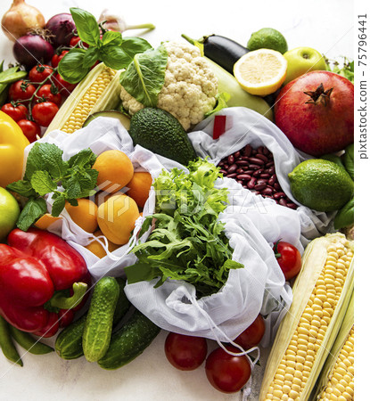 A variety of organic fruits and vegetables A variety of organic fruits and vegetables 75796441