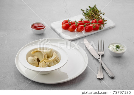 Frozen semifinished dumplings stuffed with meat Frozen semifinished dumplings stuffed with meat 75797180