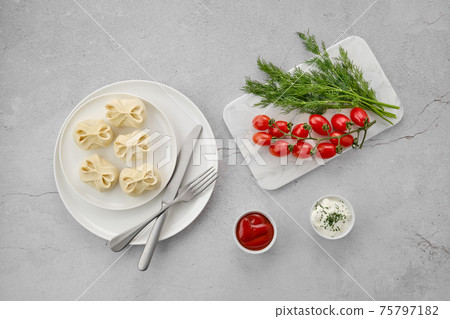 Top view of frozen semifinished manti stuffed with meat Top view of frozen semifinished manti stuffed with meat 75797182