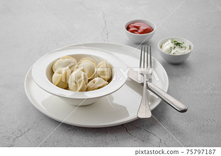 Frozen semifinished dumplings stuffed with meat Frozen semifinished dumplings stuffed with meat 75797187
