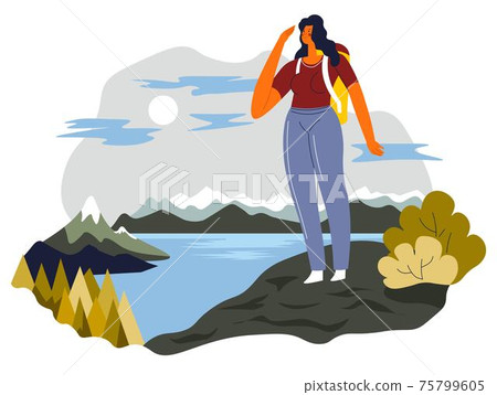 Woman looking at mountains lake standing on top 75799605