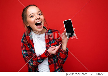 Photo of beautiful overjoyed smiling young woman good looking wearing casual stylish outfit standing Photo of beautiful overjoyed smiling young woman good looking wearing casual stylish outfit standing 75800223