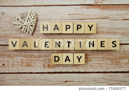 Happy Valentines day alphabet letter on wooden background 75800577