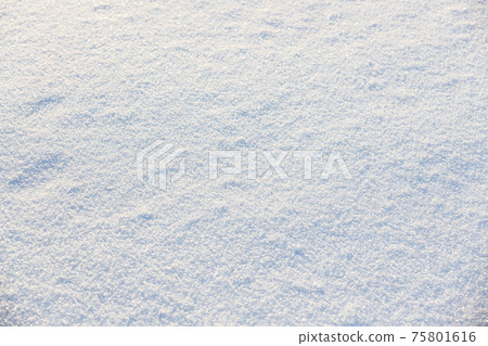 Fresh snowdrift surface on a sunny day 75801616