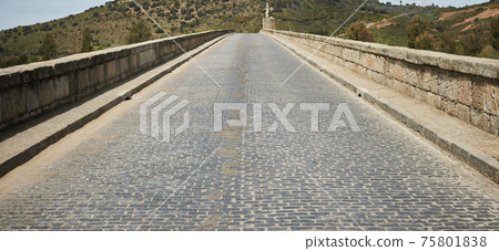 Causeway over Roman stone and cobbled bridge Causeway over Roman stone and cobbled bridge 75801838