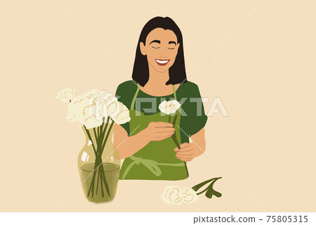 Woman make a bouquet of white tulips  75805315