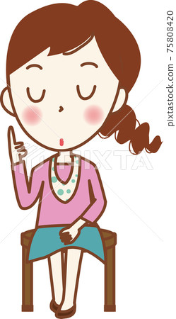 一個女人坐在椅子上,專心致志。 一個女人坐在椅子上,專心致志。 75808420