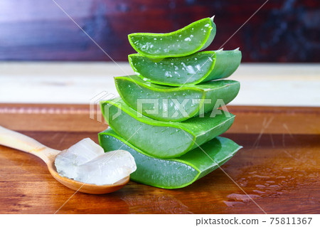 Green fresh Aloe vera sliced fresh aloe on wood table 75811367