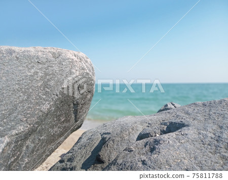 Rocks sea blue sky summer background 75811788