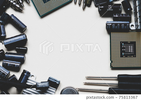 Top view of computer parts and components on white background with copy space in the center. Top view, flat lay. 75813367