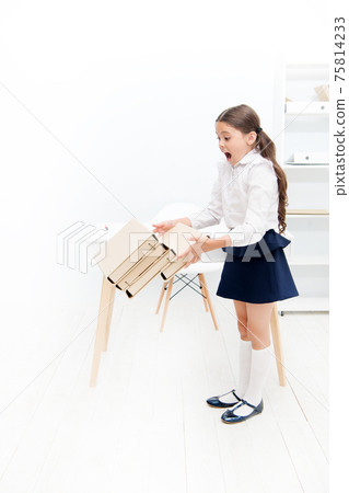 only not this. back to school. shouting girl with workbook  75814233