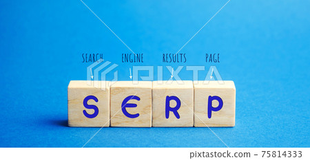 Wooden blocks with the word SERP - Search Engine Results Page. Pages displayed by search engines in response to a query by a user. Internet technology concept. Organic and sponsored search 75814333