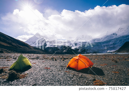 Camping facing beautiful glacier mountains in tibet,China Camping facing beautiful glacier mountains in tibet,China 75817427