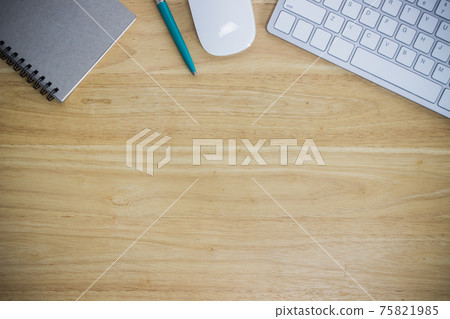 Workplace with notebook and keyboard, mouse on wooden table Workplace with notebook and keyboard, mouse on wooden table 75821985