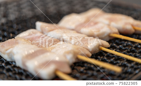 Grilled tongue skewer (pork toro) charcoal grilled on a shichirin Grilled tongue skewer (pork toro) charcoal grilled on a shichirin 75822305