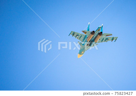 Russia, Khabarovsk - May 9, 2020: Su-34 front-line fighter-bomber . Parade in honor of victory. Military air parade in honor of Victory Day.  75823427