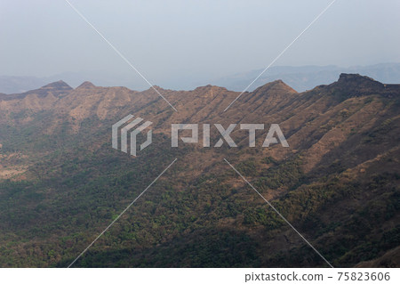 Suvela Machi a long strip of fortified walls and hill view of Rajgad fort, Pune, Maharashtra, India. 75823606