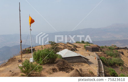 View of community meeting hall and the top view of Rajgad fort, Pune, Maharashtra, India. 75823618