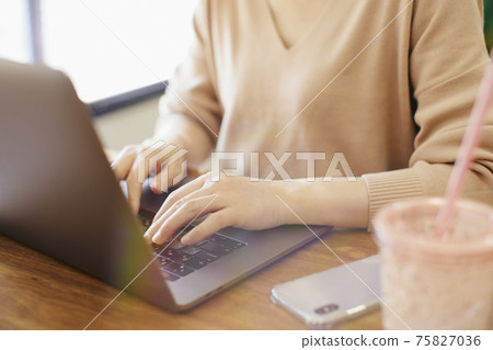 Woman doing work at home 75827036