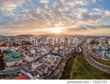 Aerial view of Dalat city. The city is located on the Langbian Plateau in the southern parts of the Central Highlands region of Vietnam Aerial view of Dalat city. The city is located on the Langbian Plateau in the southern parts of the Central Highlands region of Vietnam 75827331