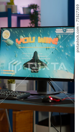 Professional esports woman gamer wining playing on RGB powerful computer Professional esports woman gamer wining playing on RGB powerful computer 75827369