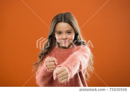 Girl hold fists ready attack or defend. Girl child cute but Girl hold fists ready attack or defend. Girl child cute but 75830508