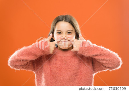 Face fitness concept. Funny grimace. Kid demonstrate Face fitness concept. Funny grimace. Kid demonstrate 75830509