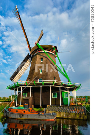 Windmills at Zaanse Schans in Holland. Zaandam, Nether Windmills at Zaanse Schans in Holland. Zaandam, Nether 75830543