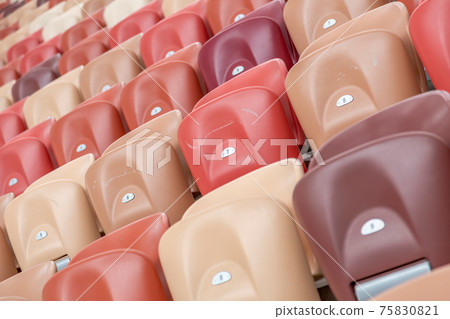 Empty seats on the tribune of a soccer stadium Empty seats on the tribune of a soccer stadium 75830821