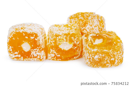 Yellow Turkish Delight sweets isolated on white 75834212
