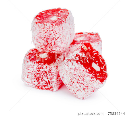 Close up of red Turkish Delight sweets isolated on white Close up of red Turkish Delight sweets isolated on white 75834244
